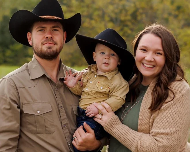 a happy family posing for a photograph
