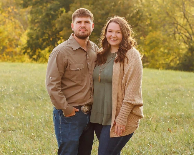 young couple on a open field