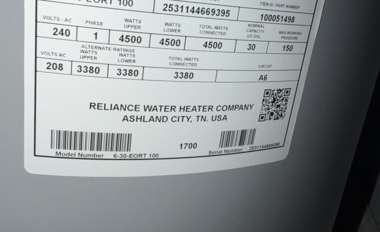 Close-up of a Reliance water heater data label highlighting the model and serial number for age verification.