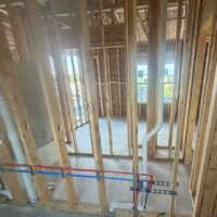 ReactNativeBlobUtilTmp jpvzszisbf829abghwec9u Horizontal PEX water supply lines protected by steel nail plates on wall studs