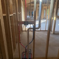 ReactNativeBlobUtilTmp su94yxch4yt0a5x3ccclm PVC drain and vent pipe rough-in inside framed wall for laundry setup in Springfield KY 40069
